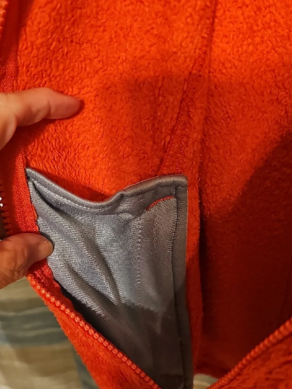 The North Face Girl's Bright Orange Plush Full-Zip Jacket with Purple Accents